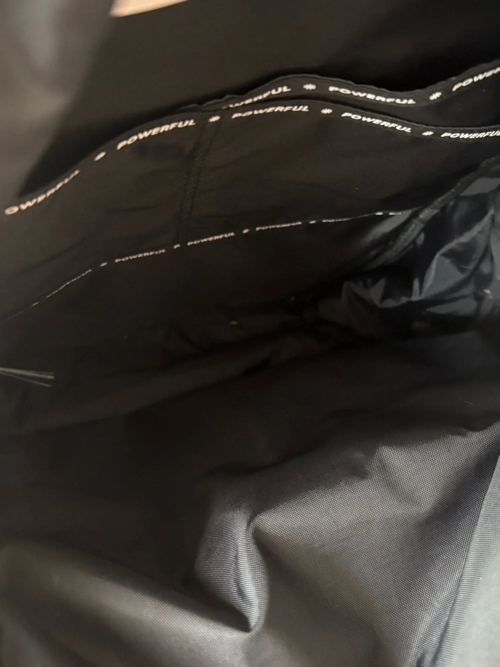 Athleta Black Interior Backpack Lining with 'POWERFUL' Trim. Great condition